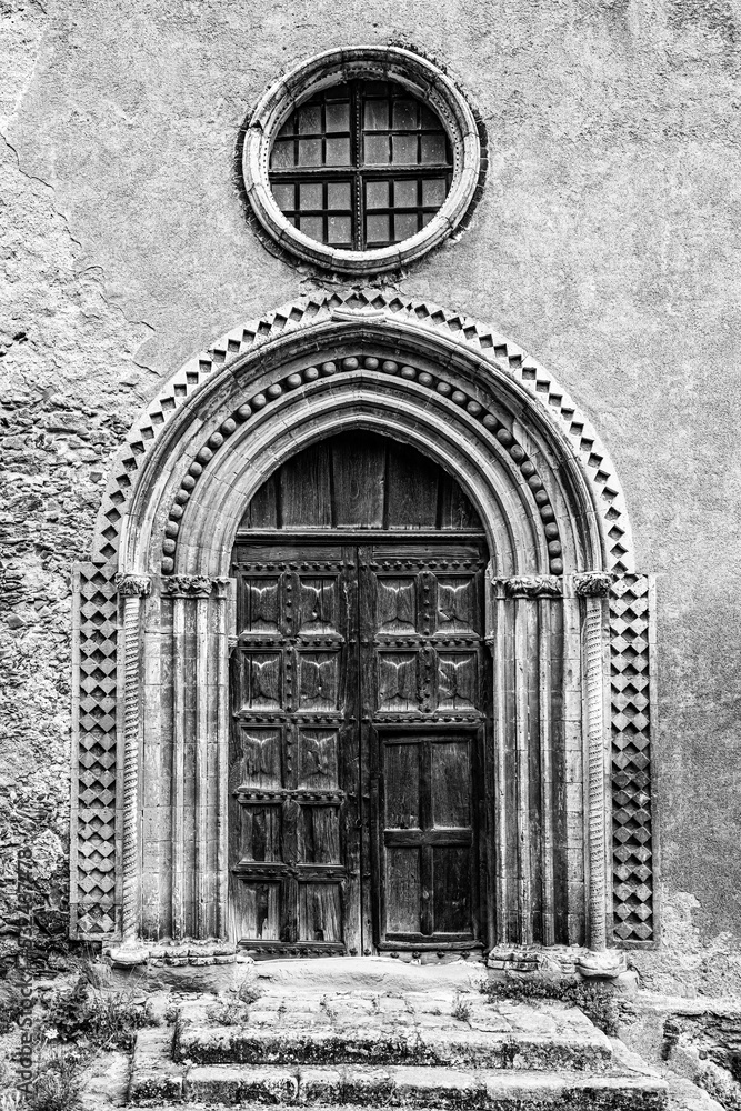 Old church door in the old town of Savoca, Sicily, Italy. Old church door in the old town of Savoca, Sicily, Italy.