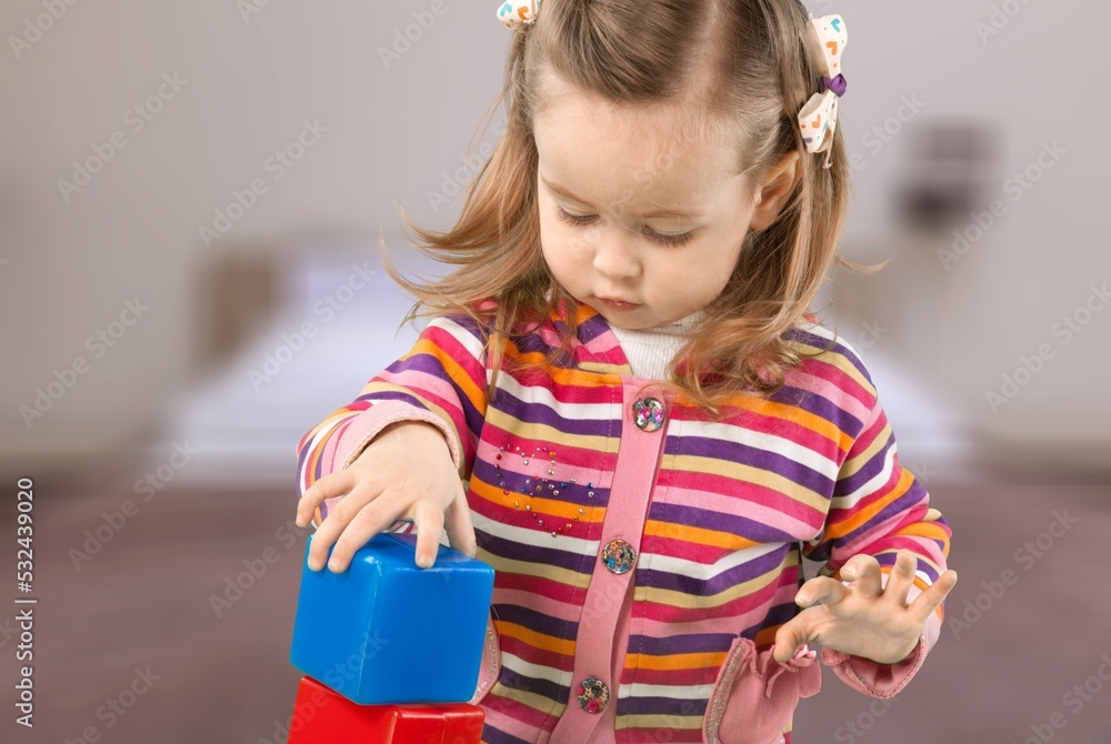 Child playing and studying alone at the room Child playing and studying alone at the room