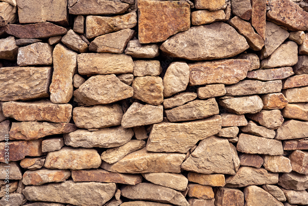 Beige rough rock wall texture bg Beige rough rock wall texture bg