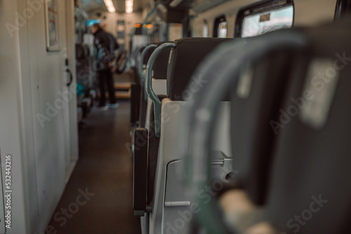 Interior coach commuter train. Train car inside. Absence of travelers passengers during the pandemic. Covid-19