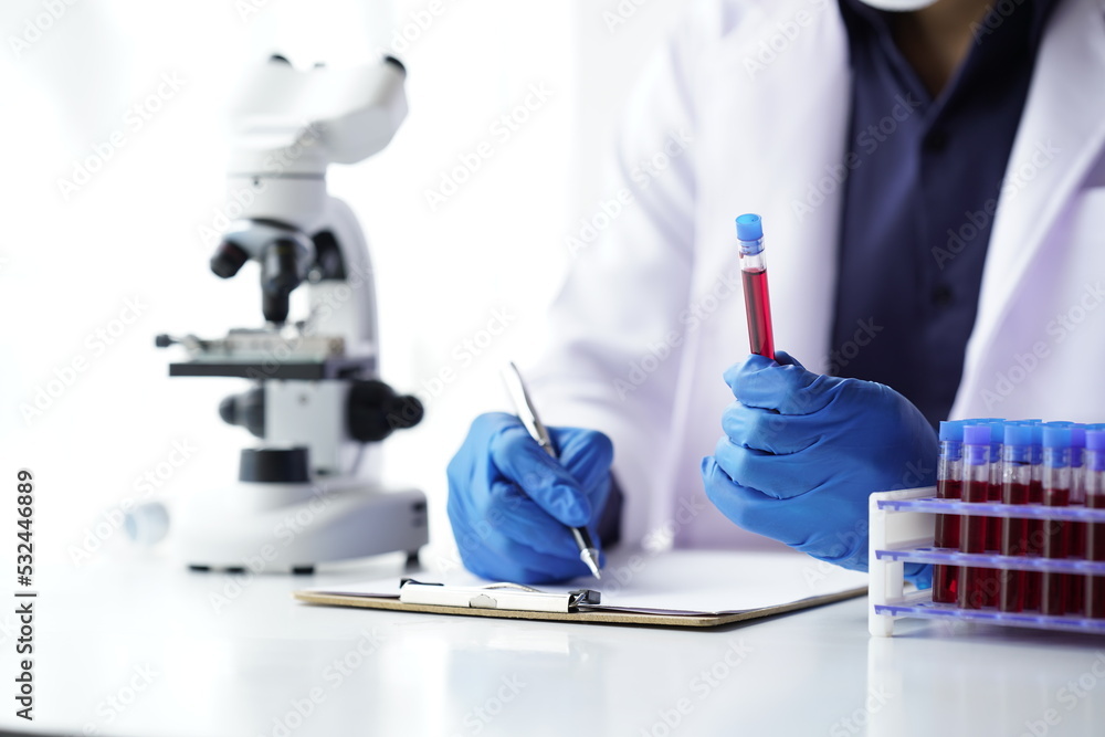 Lab worker preparing test blood for detection of antibodies and infections Corona virus.
Lab worker preparing test blood for detection of antibodies and infections Corona virus.