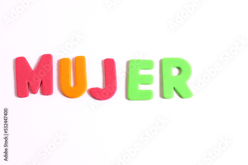 Mujer, woman word lettering in Spanish