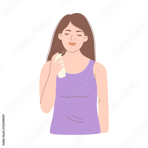 Woman spraying facial mist on her face