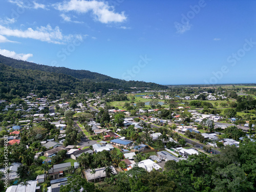 Aerial photo of tropical housing estate in mountain range © AspectDrones
