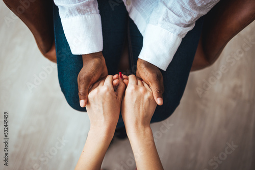 Photos Hands of woman supporting her best friend