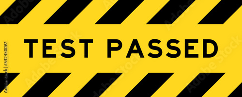Yellow and black color with line striped label banner with word test passed