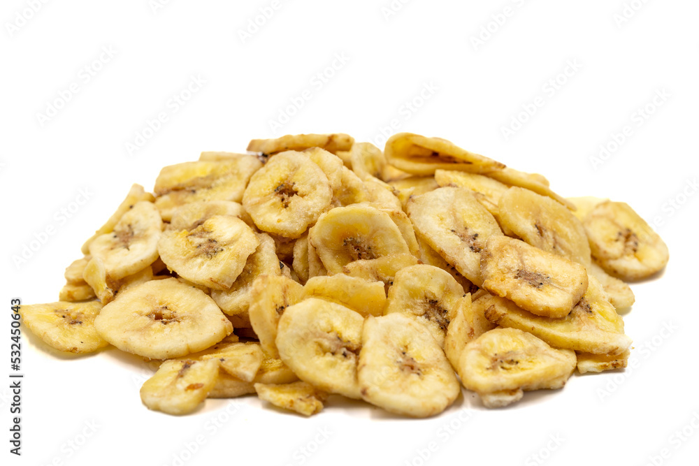 Dried banana slice isolated on white background. Dried fruit in sunlight. close up