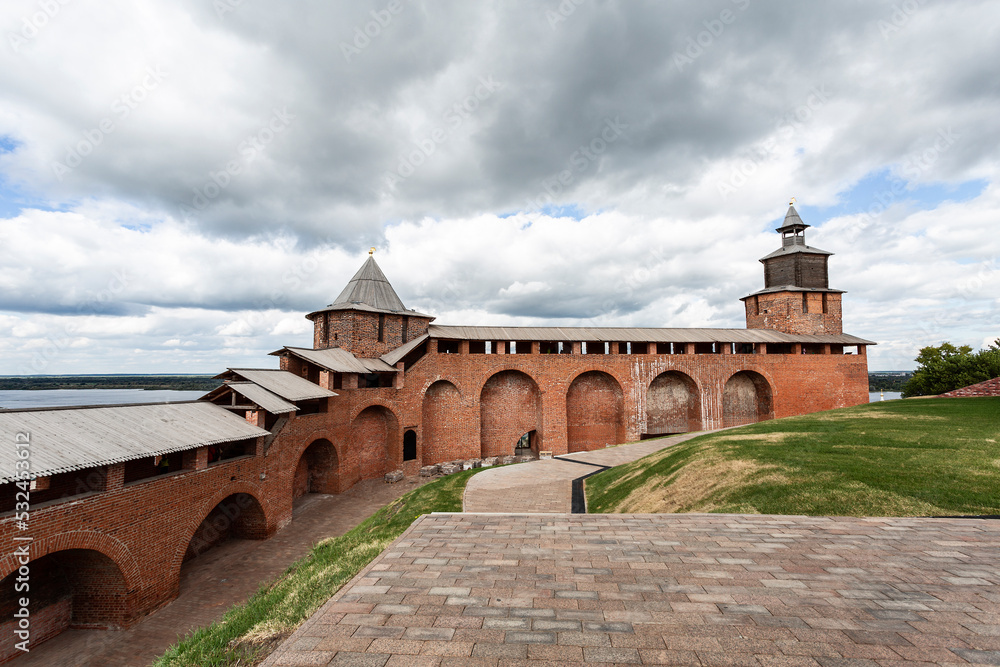 A fragment of the fortress wall of the Nizhny Novgorod Kremlin with the northern and clock towers. Nizhny Novgorod, Russia
