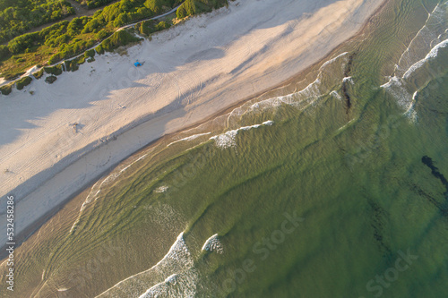 aerial view of a beach at dawn