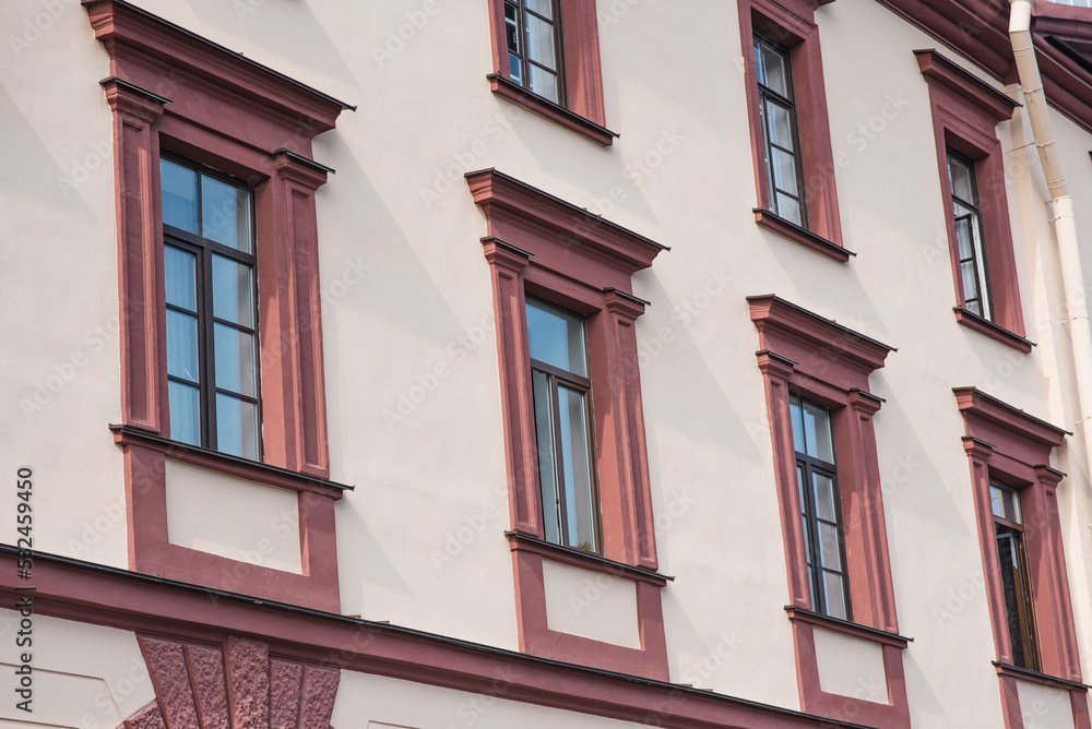 Naklejka premium View of the facade of the house with windows.