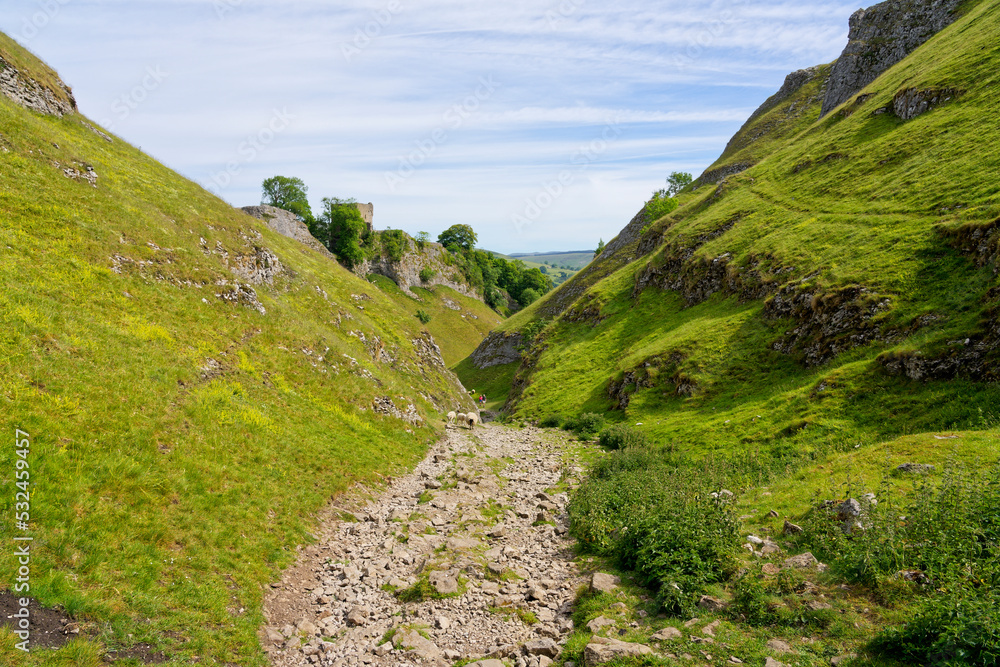 Down the steep rock covered path in Cave Dale Down the steep rock covered path in Cave Dale