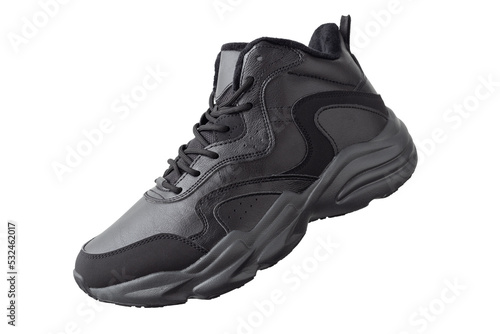 Black winter sneakers isolated on white background.