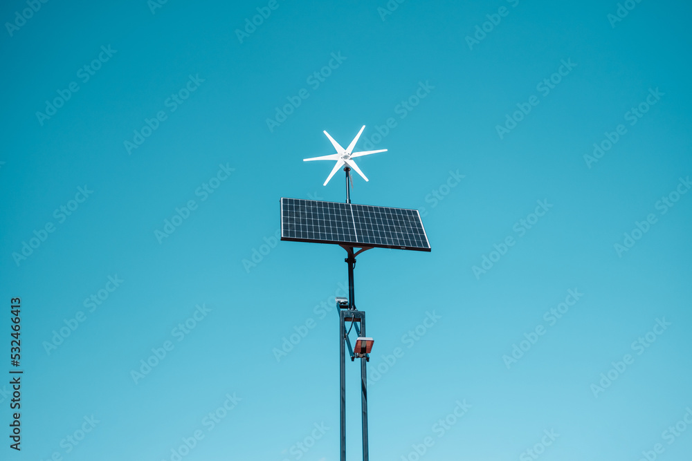 Mini solar cell panel with sunset background, sustainable energy concept. Mini solar cell panel with sunset background, sustainable energy concept.