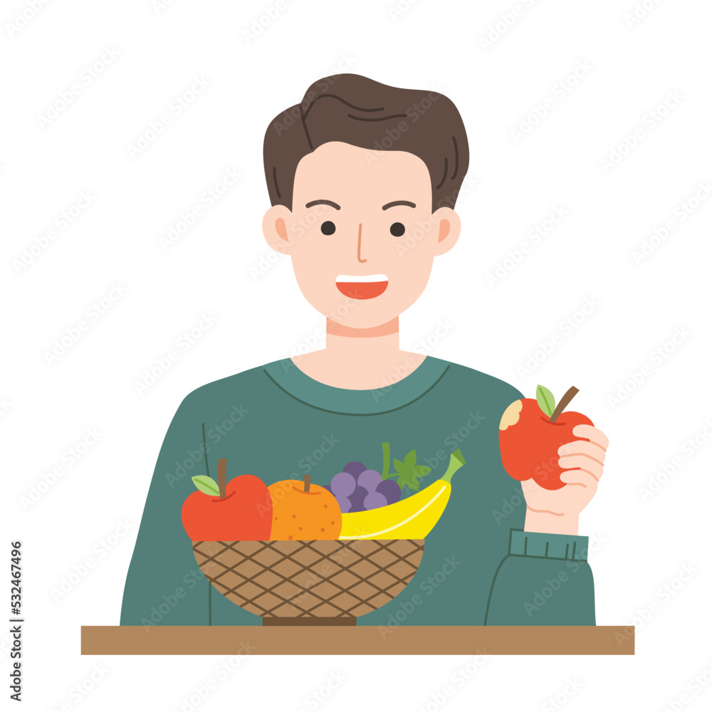 Young man eating fresh fruit. Healthy foods with benefits. Healthy and vegan food concept.