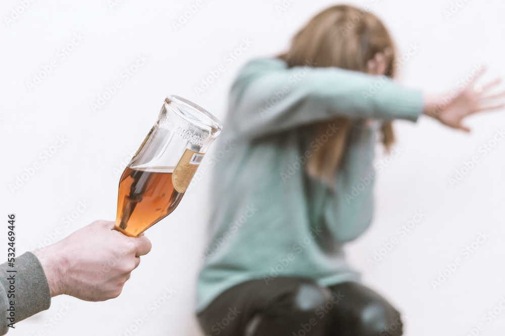 Man beating up his wife illustrating domestic violence Man beating up his wife illustrating domestic violence
