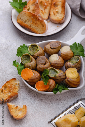 Baked snails Escargot with bread
