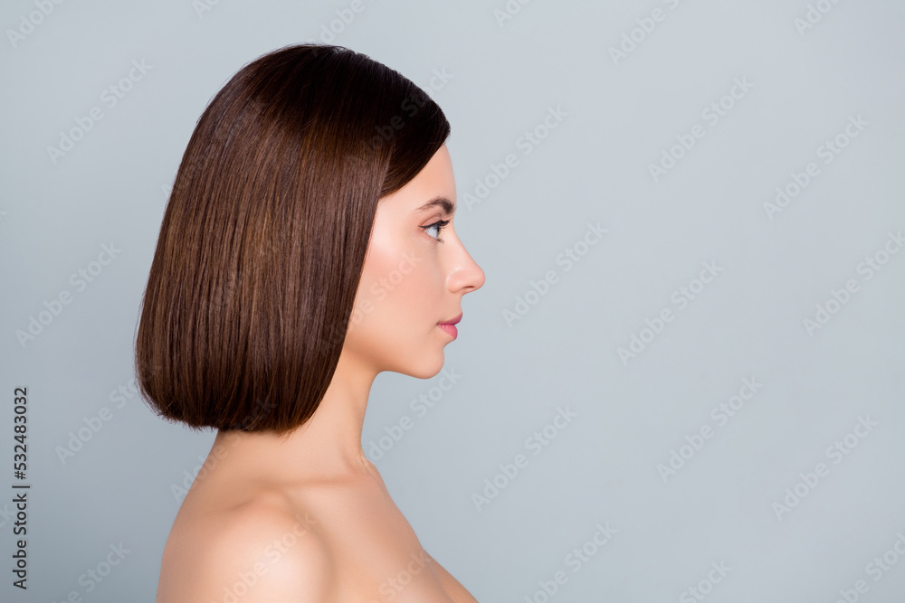 Profile side photo of gentle lady wait queue spa salon fresh rejuvenating treatment isolated over grey color background Profile side photo of gentle lady wait queue spa salon fresh rejuvenating treatment isolated over grey color background