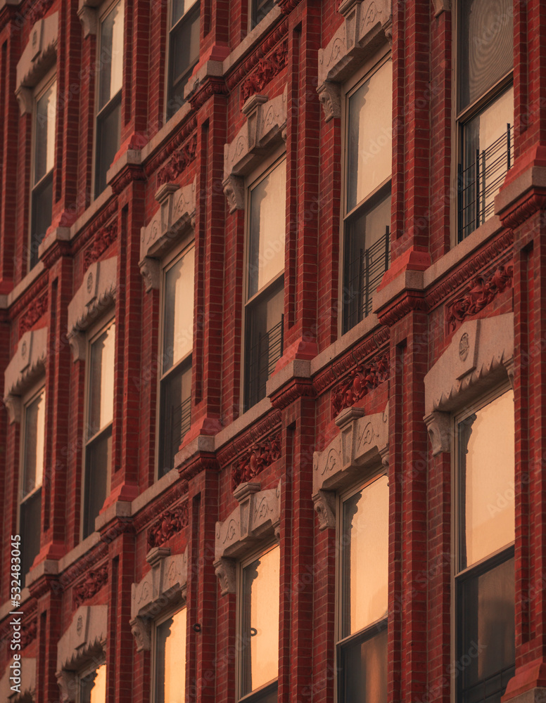 facade of an building old windows reflection sunrise sun morning New York Brooklyn facade of an building old windows reflection sunrise sun morning New York Brooklyn