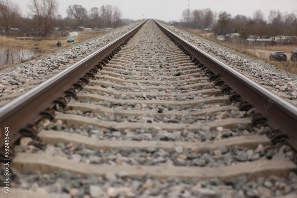 Fototapeta premium Railroad tracks on a bright cloudy day.