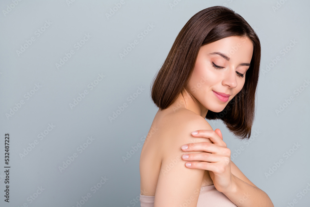 Photo of joyful lady touch arms fingers enjoy sauna wash aesthetic skin therapy isolated over grey color background Photo of joyful lady touch arms fingers enjoy sauna wash aesthetic skin therapy isolated over grey color background