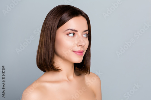 Portrait of pretty nice lady look empty space new radiant skin advert spa salon treatment isolated over grey color background