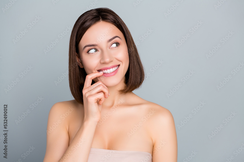 Portrait of thoughtful lady dreamy silky soft skin rejuvenation therapy isolated over grey color background Portrait of thoughtful lady dreamy silky soft skin rejuvenation therapy isolated over grey color background