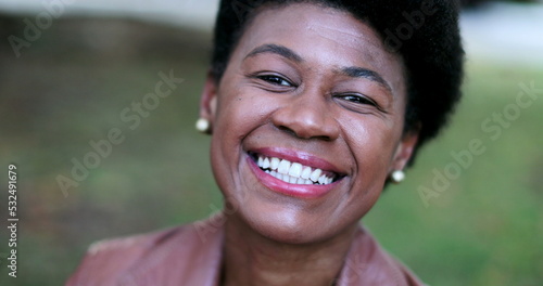 Portrait black African woman smiling outside