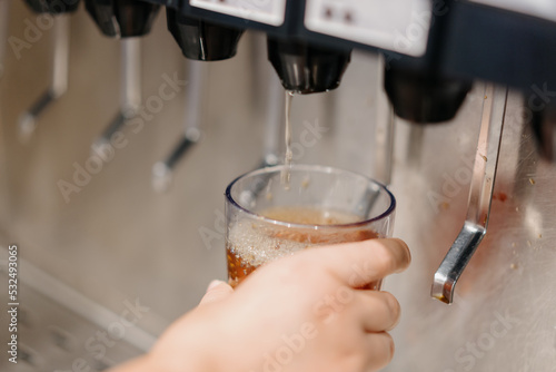 pouring water into a glass