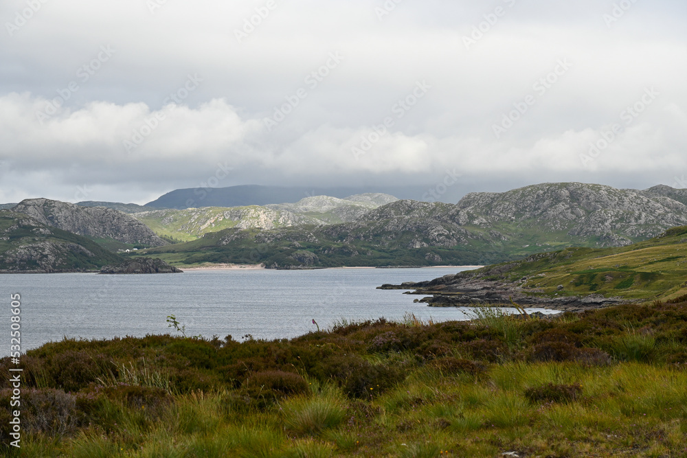 View of Little Loch Broom, sea bay on the west coast of Scotland, Highland, with mountains in the background Landscape