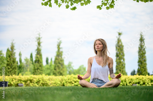 Wallpaper Mural Girl practice yoga meditation outdoor in park Torontodigital.ca