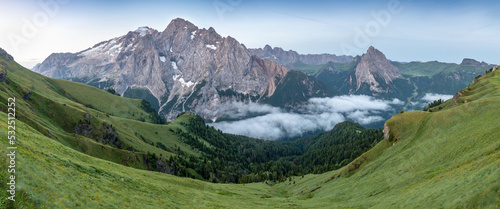 Summer Panorama in Val Badia  Dolomites. In the background the Marmolada  located at the Dolomiti Range  Italy