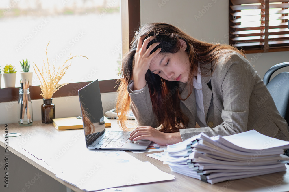 Concept Burnout Syndrome. Business Woman feels uncomfortable working. Which is caused by stress, accumulated from unsuccessful work And less resting body. Consult a specialist psychiatrist. Concept Burnout Syndrome. Business Woman feels uncomfortable working. Which is caused by stress, accumulated from unsuccessful work And less resting body. Consult a specialist psychiatrist.