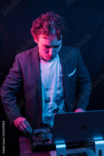 person working on DJ Set up