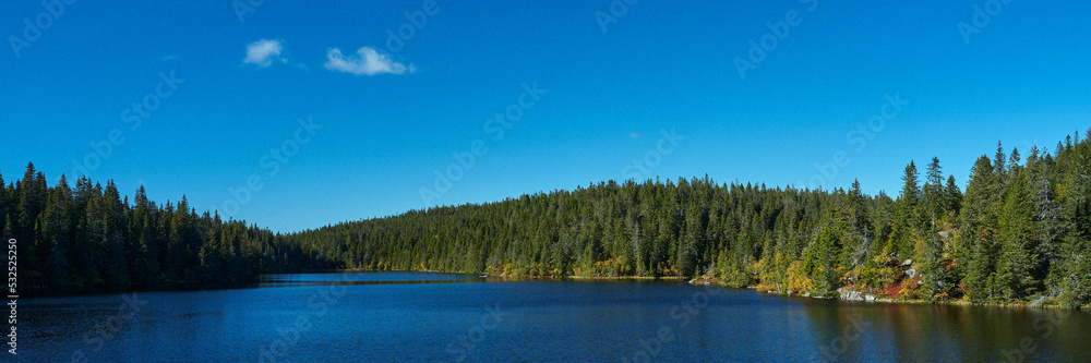 Obraz premium Image from a trip to the Svartdalstjerna Lakes, a forest nature reserve of the Totenaasen Hills, Oppland, Norway, at autumn of the year 2022.