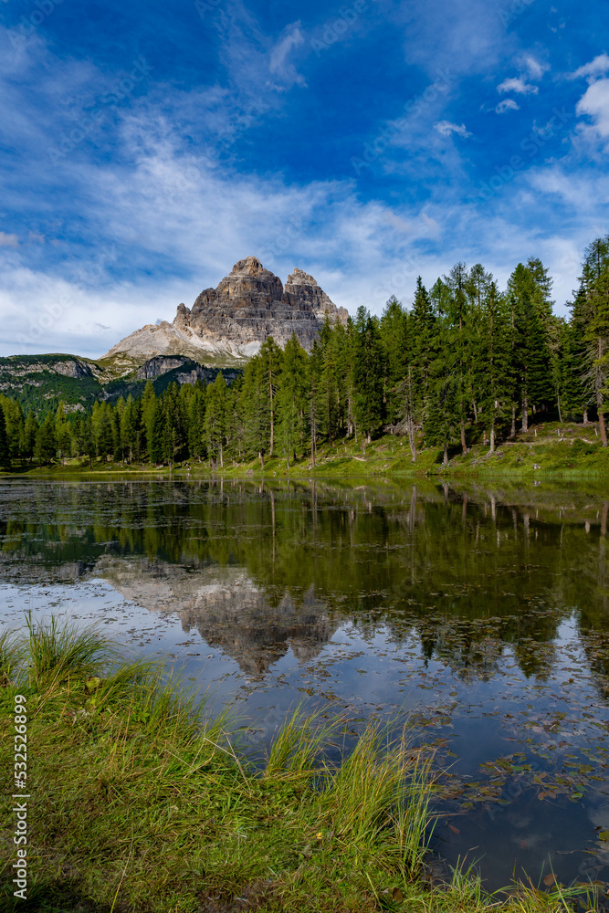 reflection in the lake around the dolomites
