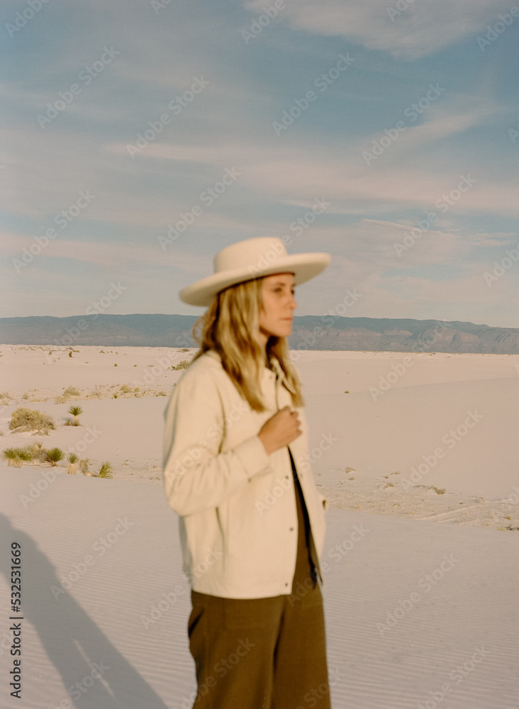 © Caleb Gaskins/Stocksy - Woman with Hat