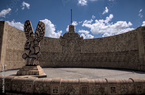 Traffic circle sculpture monumento a la patria in Merida city Mexico. Hand carved to honor the mayan heritage of Mexican indigenous people. 