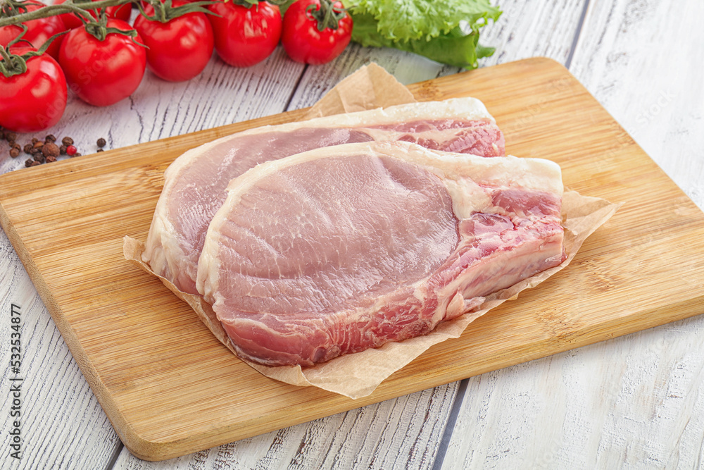 Raw pork t-bone steak for grill