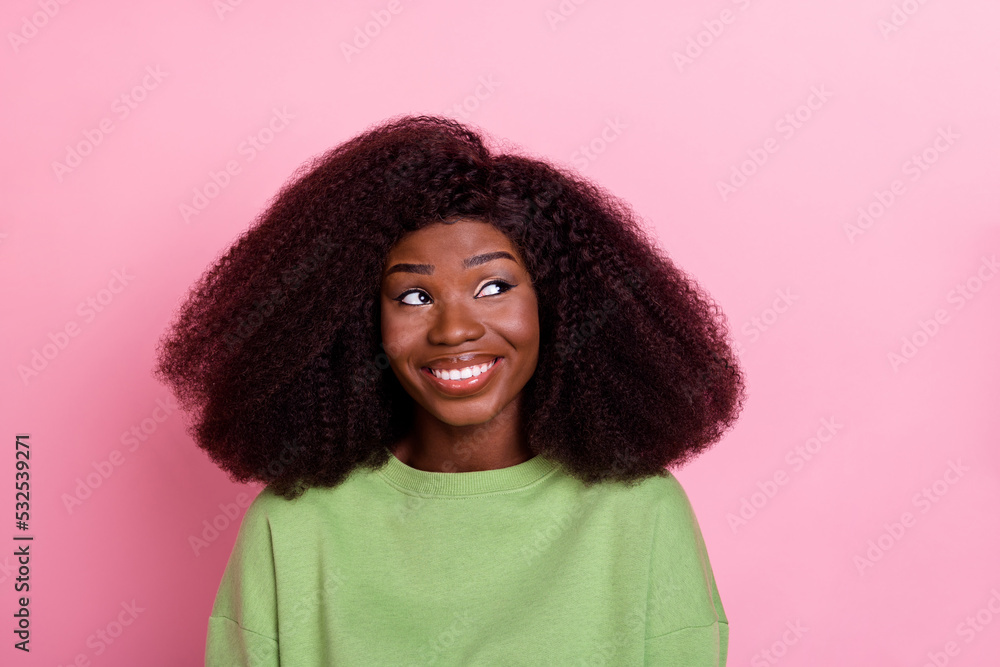 Photo of lovely big hairdo brunette lady look empty space wear green pullover isolated on pink color background Photo of lovely big hairdo brunette lady look empty space wear green pullover isolated on pink color background