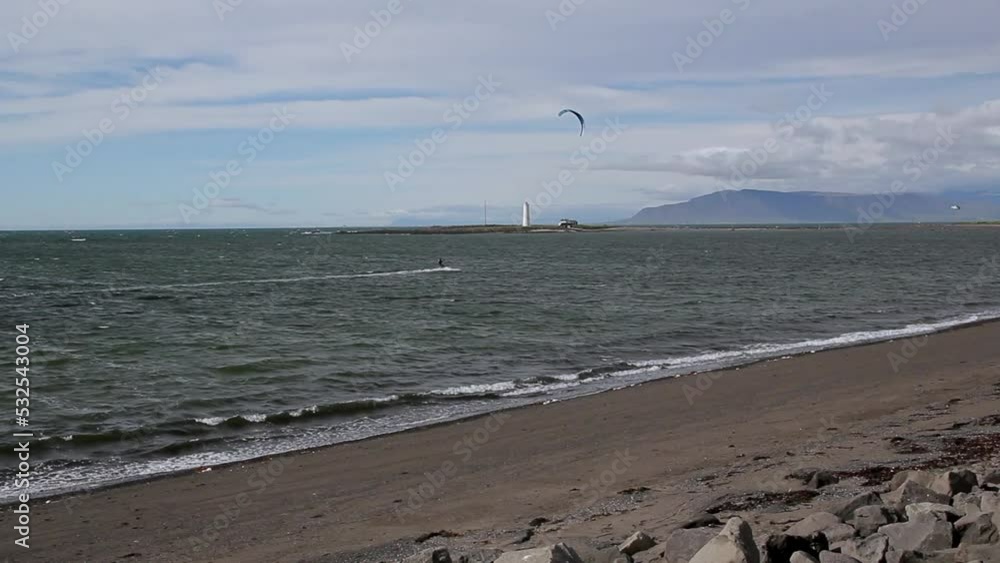 a kitesurfer at the bay of seltjarnarnes near Reykjavik 