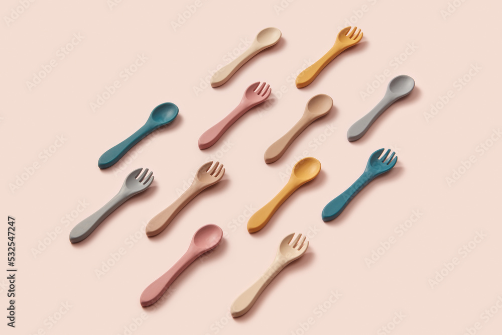 Arrangement of kids silicone spoons and forks Arrangement of kids silicone spoons and forks