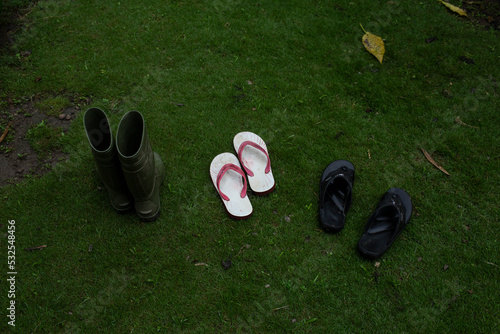 Soaking boots and slippers in Monsoon photo