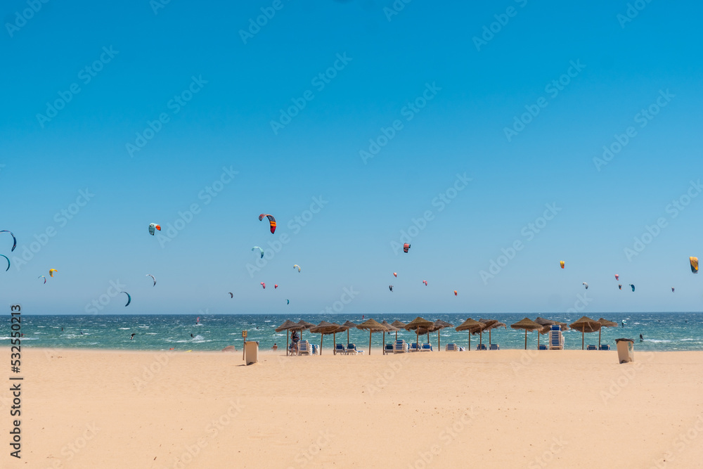 Kitesurf sport on the Caños de Meca beach on the Costa de la Luz, Cadiz. Andalusia