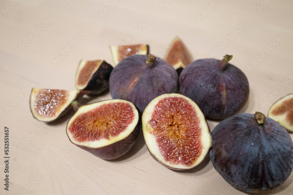 figs on a light table surface. Exotic fruits, vitamins, problems with the supply of fruit to Russia figs on a light table surface. Exotic fruits, vitamins, problems with the supply of fruit to Russia