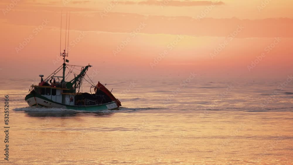 Fishing boat returned from the sea at sunrise, Itajaí - Santa Catarina Fishing boat returned from the sea at sunrise, Itajaí - Santa Catarina