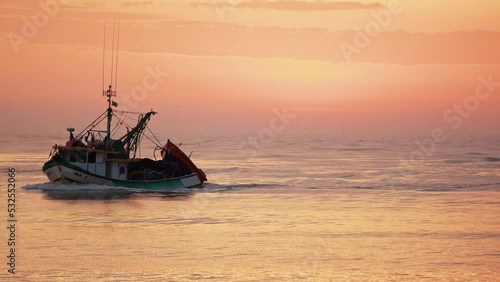Fishing boat returned from the sea at sunrise, Itajaí - Santa Catarina