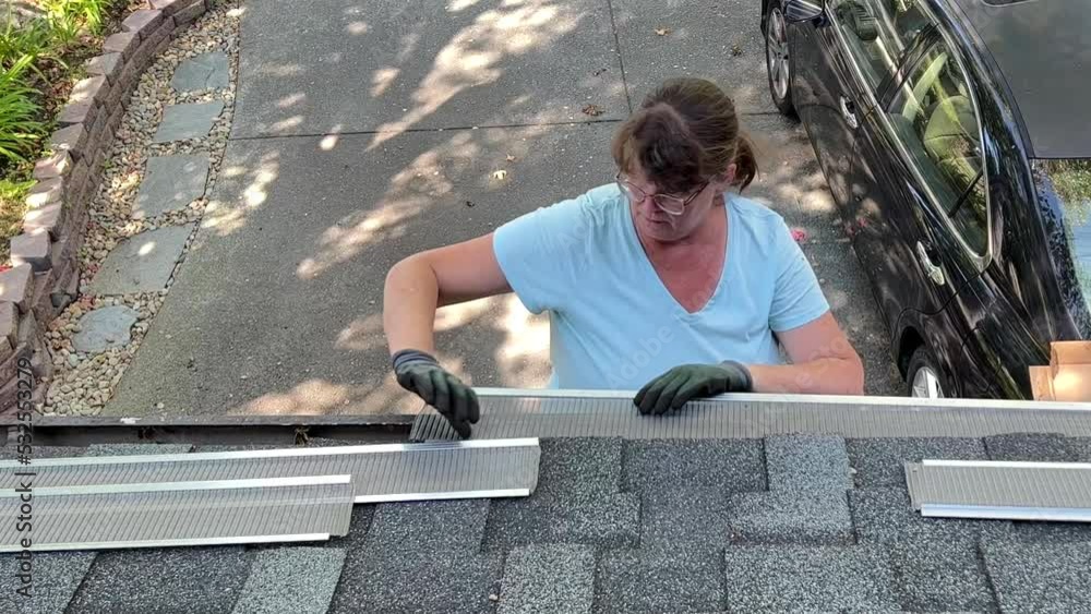 4K HD video panning across as an older caucasian woman wearing basic