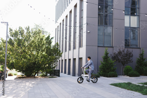 Office employee commuting on bike  photo