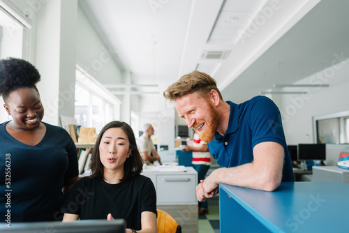 Colleagues Working Together in Office photo