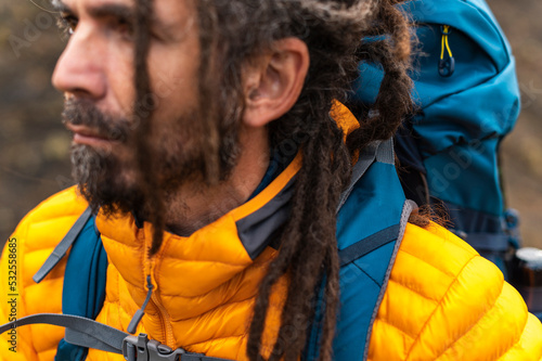 Adult montaineer with gray hair and dreadlocks
 photo